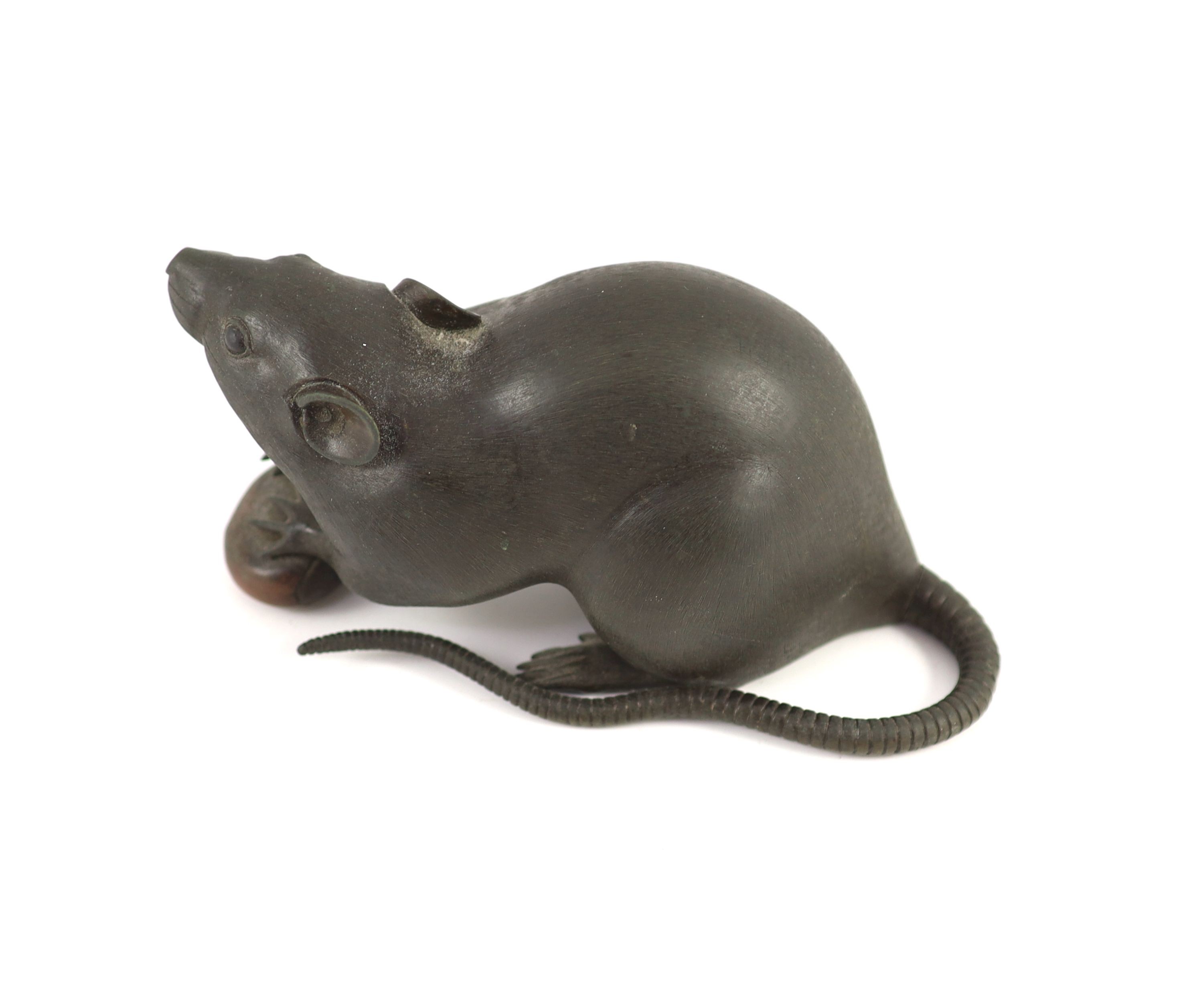 A Japanese two colour bronze figure of a rat, Meiji period, signed Seishu, 18cm long